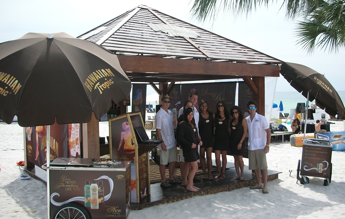 Experiential Marketing Activation pop-up cabana by Evolve Activation, a product sampling agency for Hawaiian Tropic Sunscreen