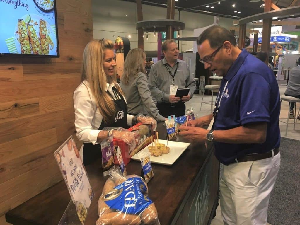FMCG product sampling marketing activation at a tradeshow in Las Vegas