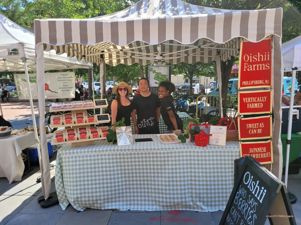 Experiential Marketing Team Product Sampling at a Farmers Market