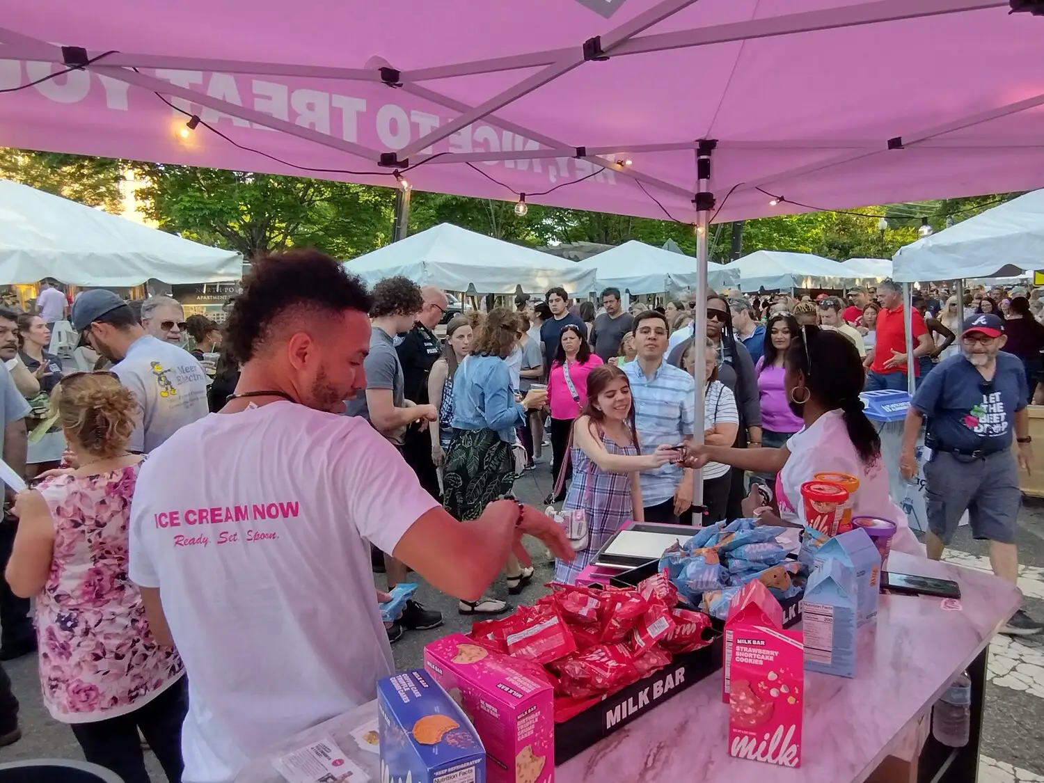 Milkbar Experiential Sampling at a Festival in Atlanta Georgia. Brand Ambassadors Helping the Target Audience. 